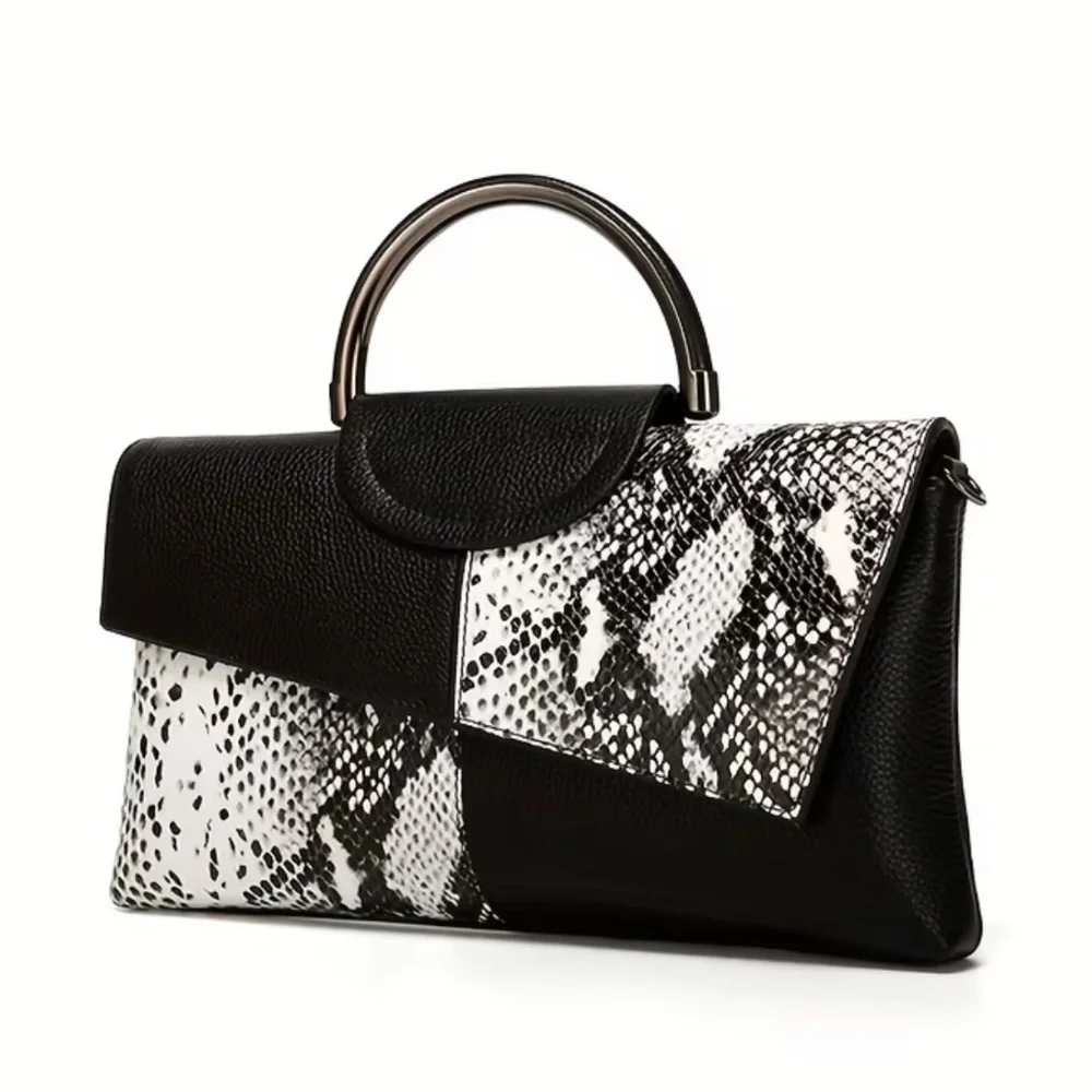 Luce black and white snakeskin clutch bag